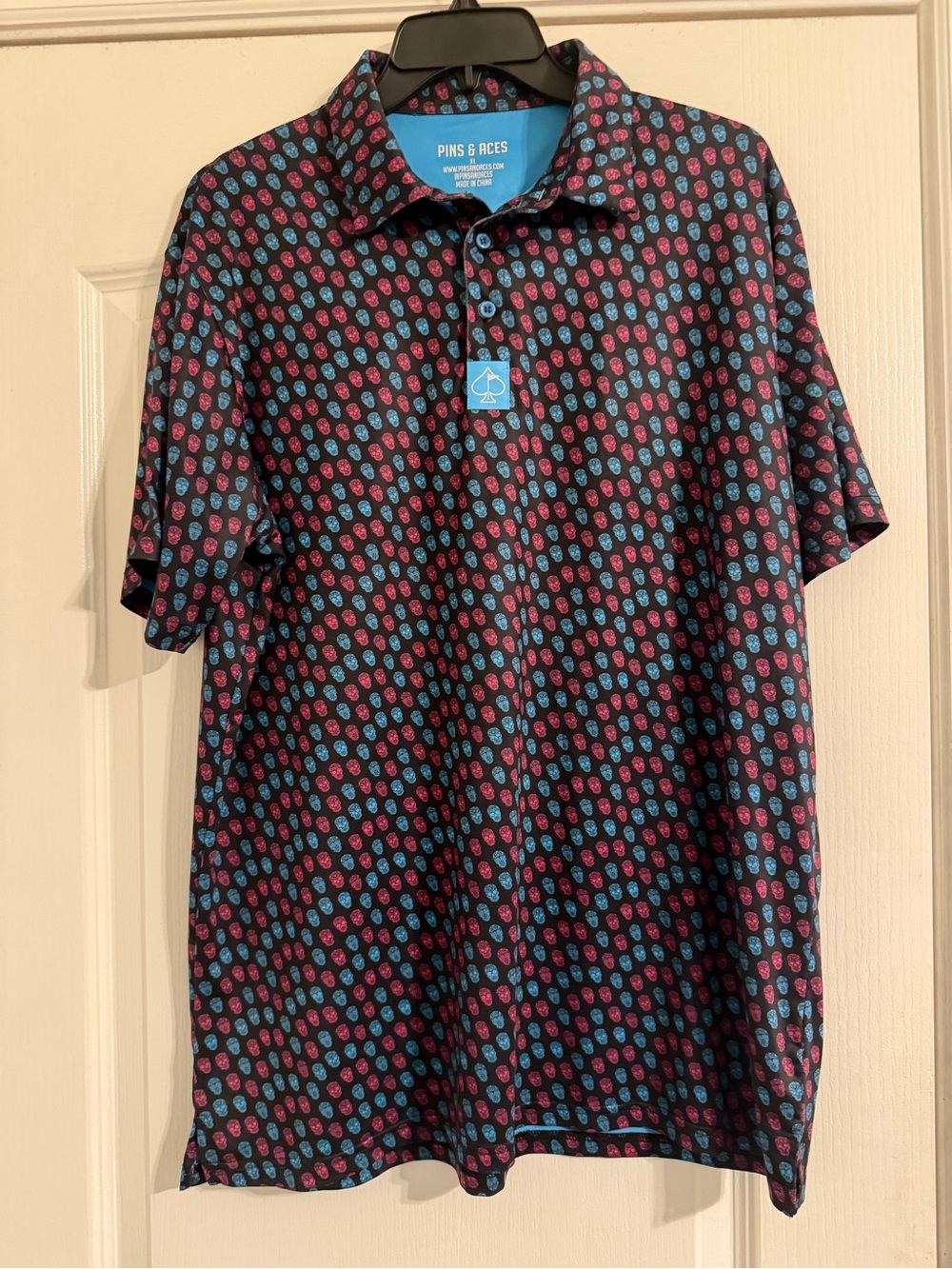Pins & Aces skulls golf polo